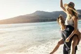 Couple enjoying marriage retreat on the beach