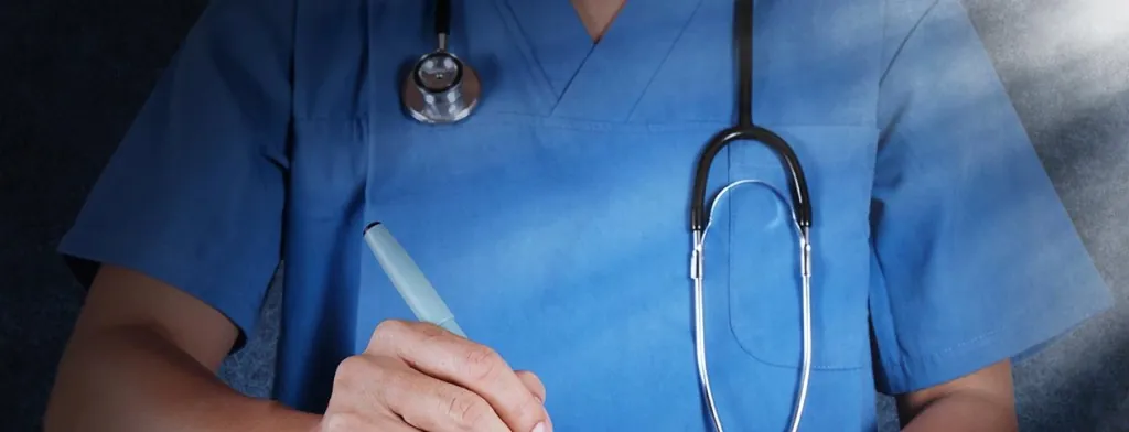 Medical professional holding a clipboard