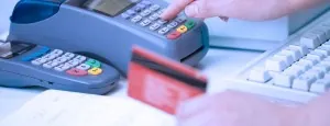 Person using a payment card at a terminal