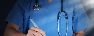 Medical professional holding a clipboard