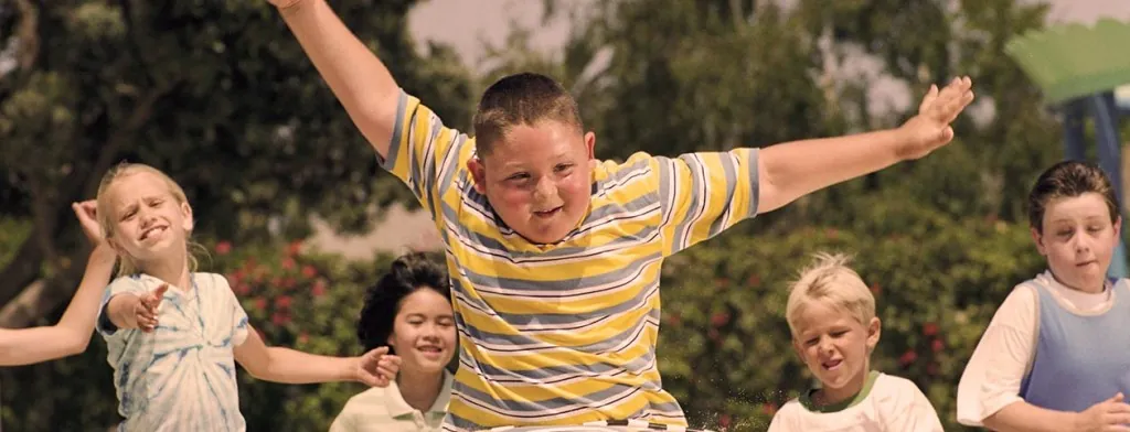 Children running together outdoors
