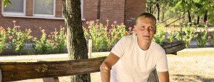 Man sitting on bench having a successful alcohol rehab