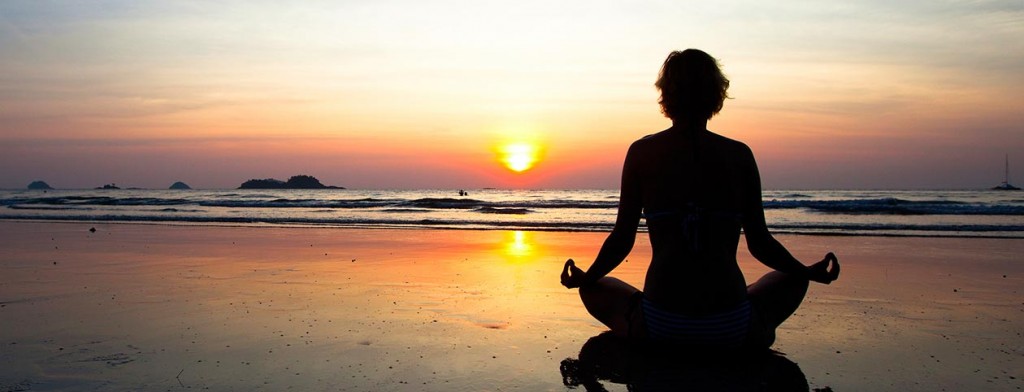 Woman practicing yoga at weight loss camp