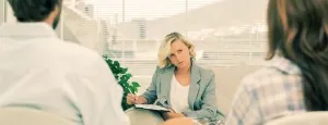 Couple speaking with a counselor