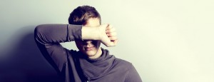 Man displaying physical symptoms of depression