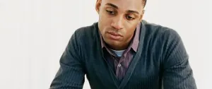 Man sitting with a thoughtful expression