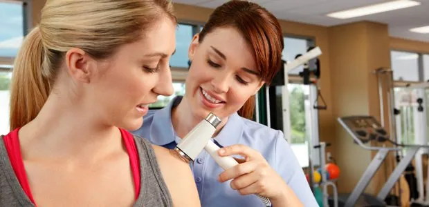 Therapist demonstrating an ultrasound treatment device