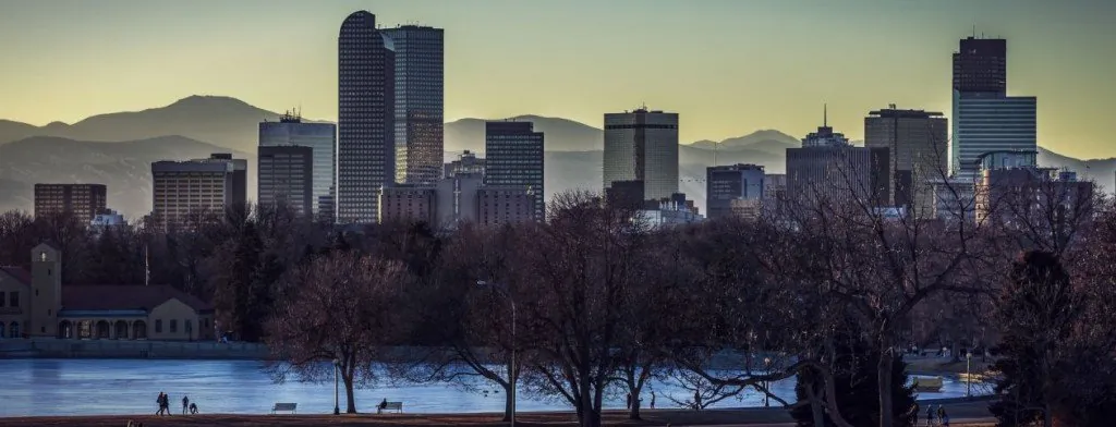 City skyline with mountains in the distance