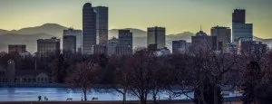 City skyline with mountains in the distance