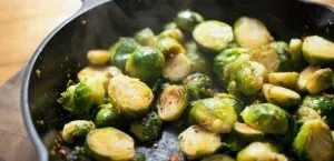 Brussels sprouts cooking in a pan