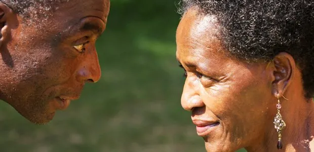 Two people smiling at each other