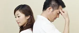 Two people turned away from each other