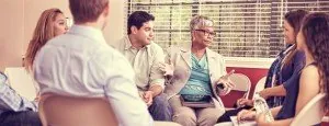 People taking part in a group discussion