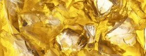 Ice cubes in a golden-colored drink