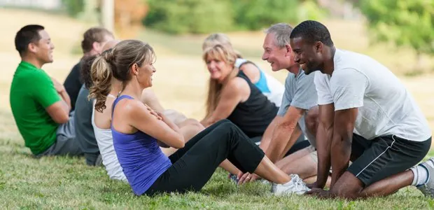 Group stretching outdoors