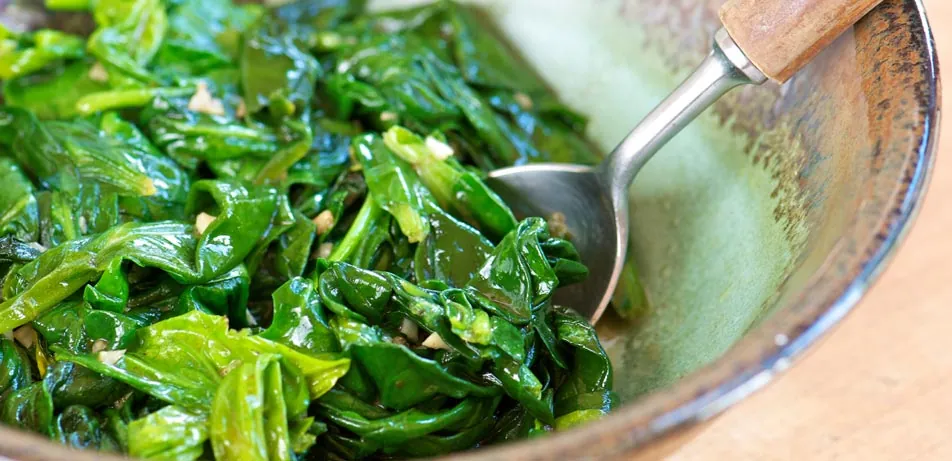 Cooked spinach in a bowl