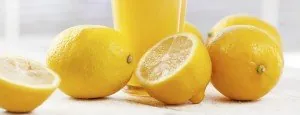 Whole and cut lemons