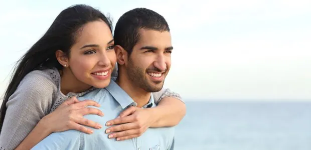 Couple embracing outdoors