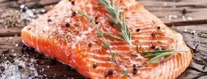 Salmon fillets seasoned with herbs and pepper