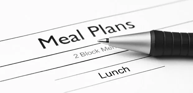 Meal planning form with a pen