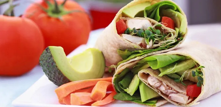 Vegan meal for those who need to lose weight now Vegetable wrap with avocado and tomato