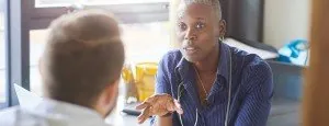 Doctor speaking with a patient