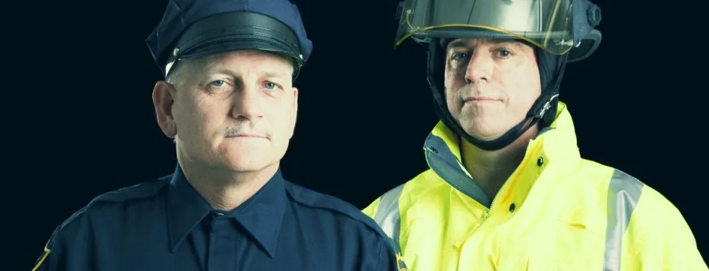 Police officer and firefighter in uniform
