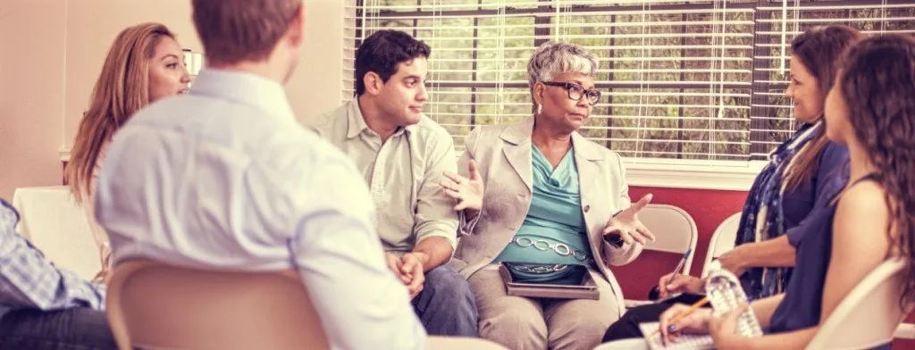 People taking part in a group discussion