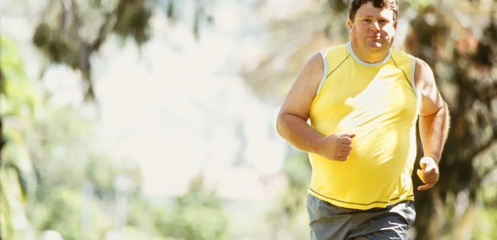 interval training for those who need to lose weight now Man jogging outdoors