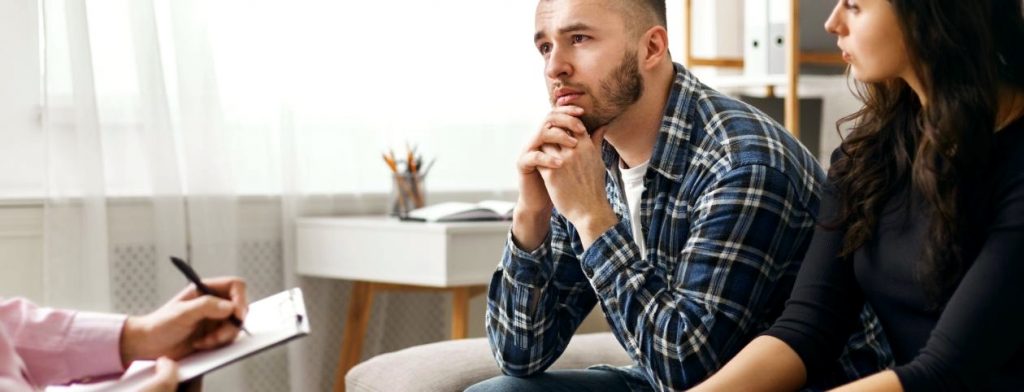 Psychologist giving marriage tips to newlyweds or premarital couple